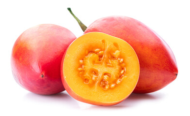 Ripe tamarillo fruits with tamarillo slices  isolated on a white background.