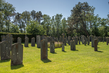 Den Helder, Netherlands, June 2022. Old dilapidated graves at the Jewish cemetery in Den Helder.