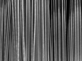 closeup of long threaded steel bars