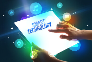 Holding futuristic tablet, new media concept