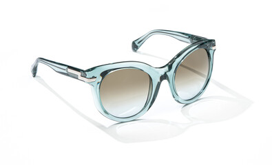 Women sunglasses in sunlight on white background. Modern stylish sunglass for holiday vacation....