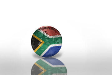Obraz premium bitcoin with the national flag of south africa on the white background. bitcoin mining concept.