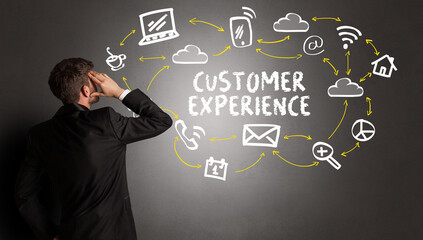 businessman drawing social media icons