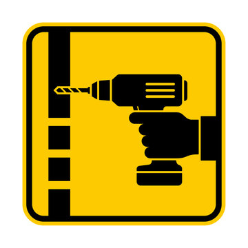 recommend clip art: Vector yellow icon of a hand holding a drill drilling a hole. Isolated on white background.