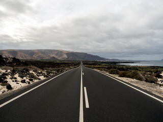 long lonely road on the beach
