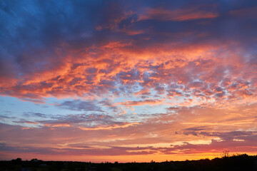 Fototapeta na wymiar Cloudscape of cumulus sunset clouds