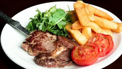 Steak and Chips with Tomato and Rocket