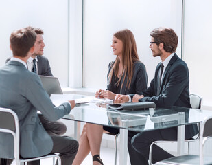 business people discuss something during a business meeting.