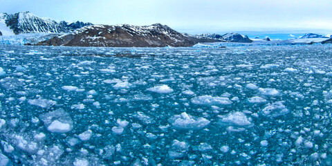 Drift floating Ice and Snowcapped Mountains, Iceberg, Ice Floes, Albert I Land, Arctic, Spitsbergen, Svalbard, Norway, Europe