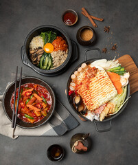Bibimbap Mixed rice, Jjamppong Korean noodle soup with gochutgaru chili powder, Tteok-bokki Stir-fried rice cakes, Combo Set of Korean food concept.