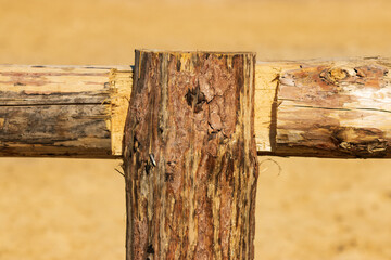 wooden fence made of logs as a background