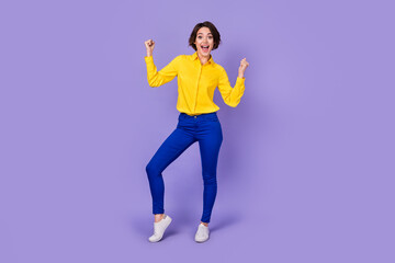 Fototapeta na wymiar Full body photo of funny millennial lady yell wear yellow shirt pants shoes isolated on violet color background