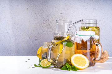Homemade cold brew tea. Set of various healthy summer drink, cold slow brewed tea in mason jar, summer cold or hot beverages, on white background copy space