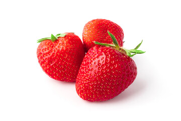 Three strawberries on a white background. Fresh ripe fruits, close up