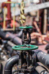 Cranes and pipes on a fuel tanker.