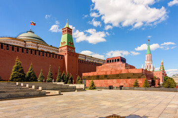 Red square in Moscow with Senate palace, Kremlin wall, towers and Lenin Mausoleum