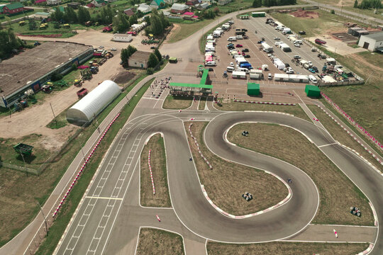 Aerial Drone View Of Curving Road For Kart Racing. Photo Of Karting Race Track, Contemporary Circuit, Top View