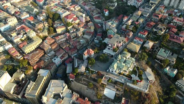 Aerial dolly out Baburizza Palace, Yugoslavian Walk and El Peral funicular in Cerro Alegre, Valparaiso, Chile
