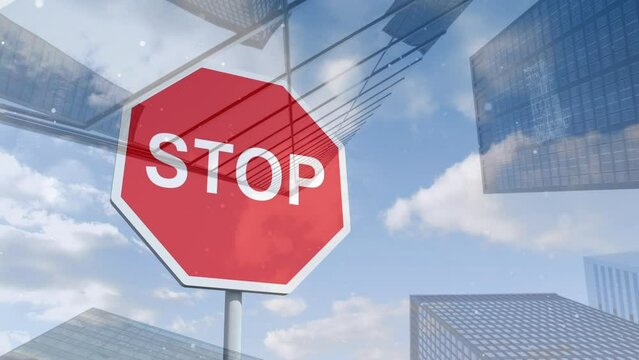 Animation of stop sign over cityscape