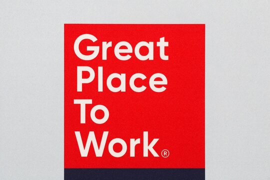 Odder, Denmark - January 14, 2022: Great place to work logo on a wall. Great place to work is the global authority on workplace culture