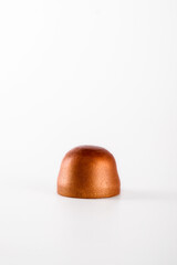 Closeup of chocolate hand painted candy bonbons on a white background. Modern chocolate design.