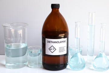 diethanolamine in bottle, chemical in the laboratory