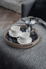 two empty white cups on the tray. coffee time