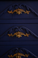 gold plated dresser handles. vintage furniture