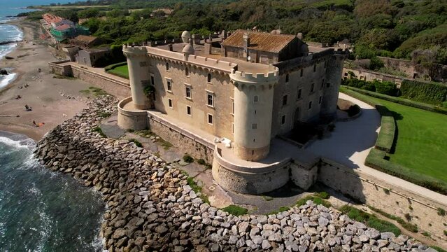 aerial scenic drone view of medieval castle on the beach of Ladispoli - Castello Palo Odescalchi. Lazio region, Italy