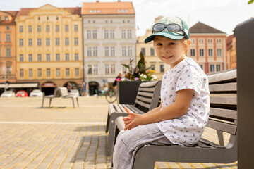 Cute child, preschool boy, bisiting town in Czech Republic, Ceske Budejovice