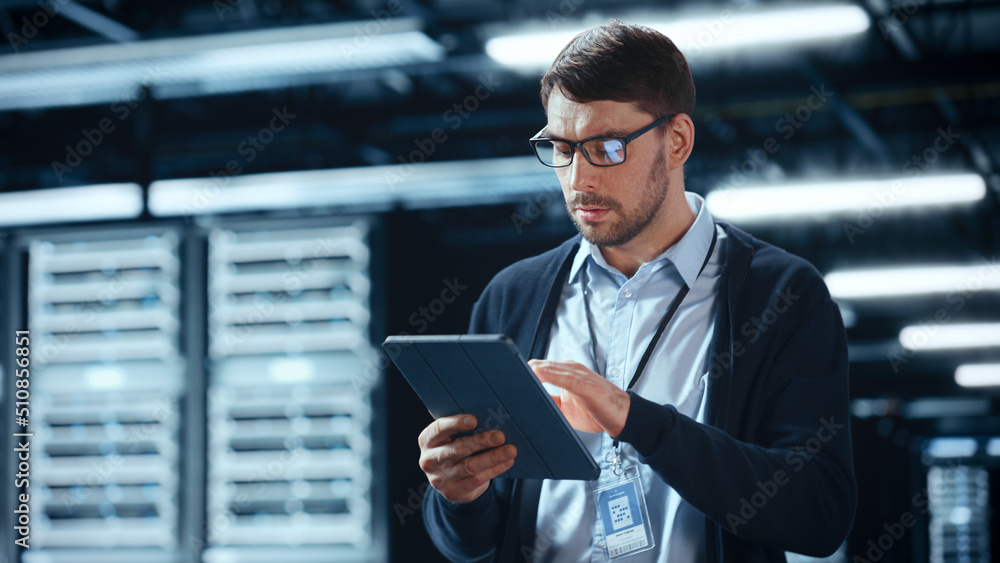 Aufkleber Male IT Specialist Walks Between Row of Operational Server Racks in Data Center. Engineer Uses Tablet Computer for Maintenance. Concept for Cloud Computing, Artificial Intelligence, Cybersecurity.