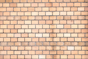 textured yellow brick wall - background