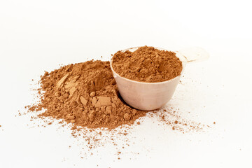Whey protein powder on scoop. Fitness and gym diet nutrition