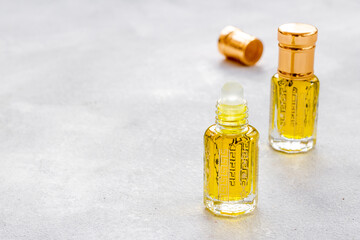 Perfume essential oil in glass bottles. Traditional Arabian incense