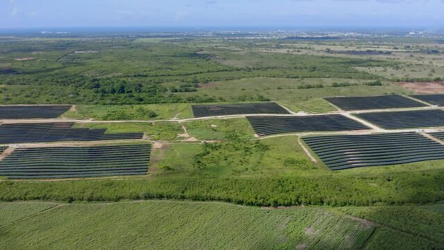 Aerial View Of Newly Constructed El Soco Photovoltaic Park In San Pedro De Macoris, Dominican Republic. sideways shot