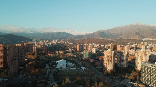 Extensive Skyline And Modern Structures Centering The Recreational Park Of Araucano In District Of Las Condes, Santiago City, Chile. Wide Aerial