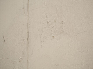 Background of a cracked white wall.