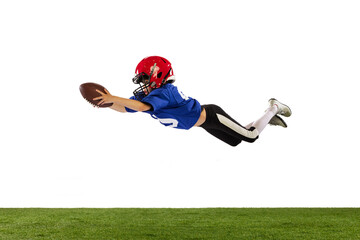Athletic kid, beginner american football player in sports uniform and helmet training isolated on white background. Concept of sport, challenges, motion, achievements.