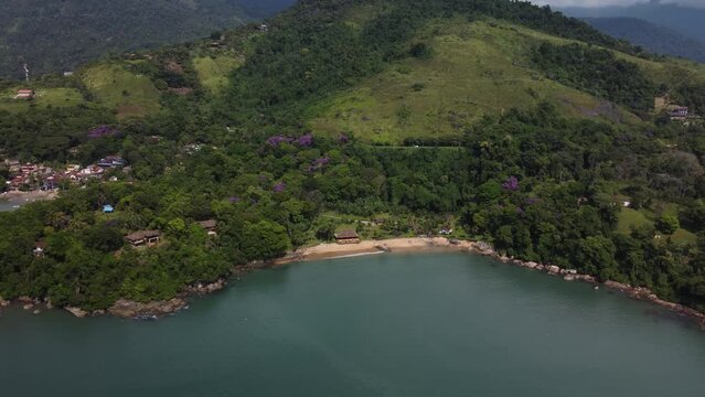 Aerial view to a small beach with the atlantic forest at the coast of Paraty, Rio de Janeiro - Brasil