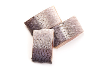 Marinated atlantic herring, sliced fish fillet, isolated on white background.