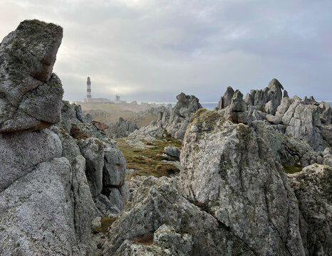 Ushan countryside scenery with Creach lighthouse on background, Brittany, France