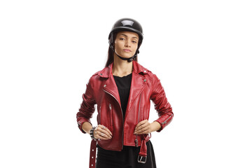 Cool female biker with a helmet standing and posing