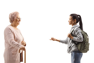 Student talking to a senior woman with a walking cane