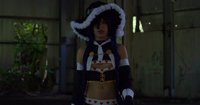 Amazing cosplayer walking in an abandoned warehouse wearing wendy belserion