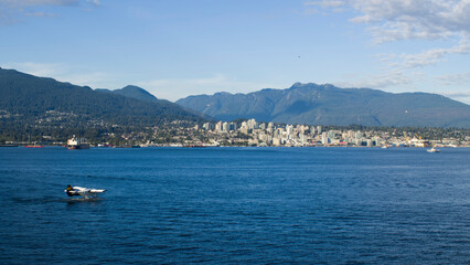Fototapeta na wymiar North Vancouver cityscape with sea plane - Vancouver Canada