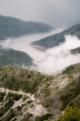 Mountain lake under the clouds. 