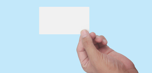 Fototapeta premium Close up of hand holding virtual card with. Credit card in hand