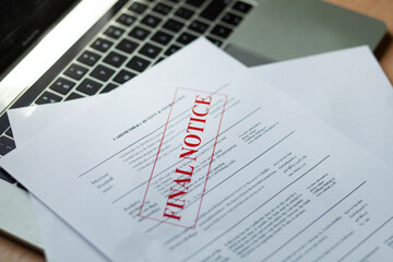 Close-up of assessment forms and documents Appraisal and Appraisal Concepts for Business. Finance. Financial measurement. on a laptop computer. Invoices, tax slips, assessment results