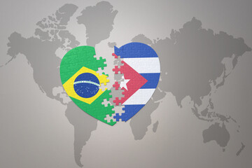 puzzle heart with the national flag of brazil and cuba on a world map background.Concept.
