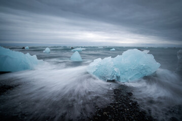 Icebergs and black sand on Jokulsarson Diamond beach, Iceland